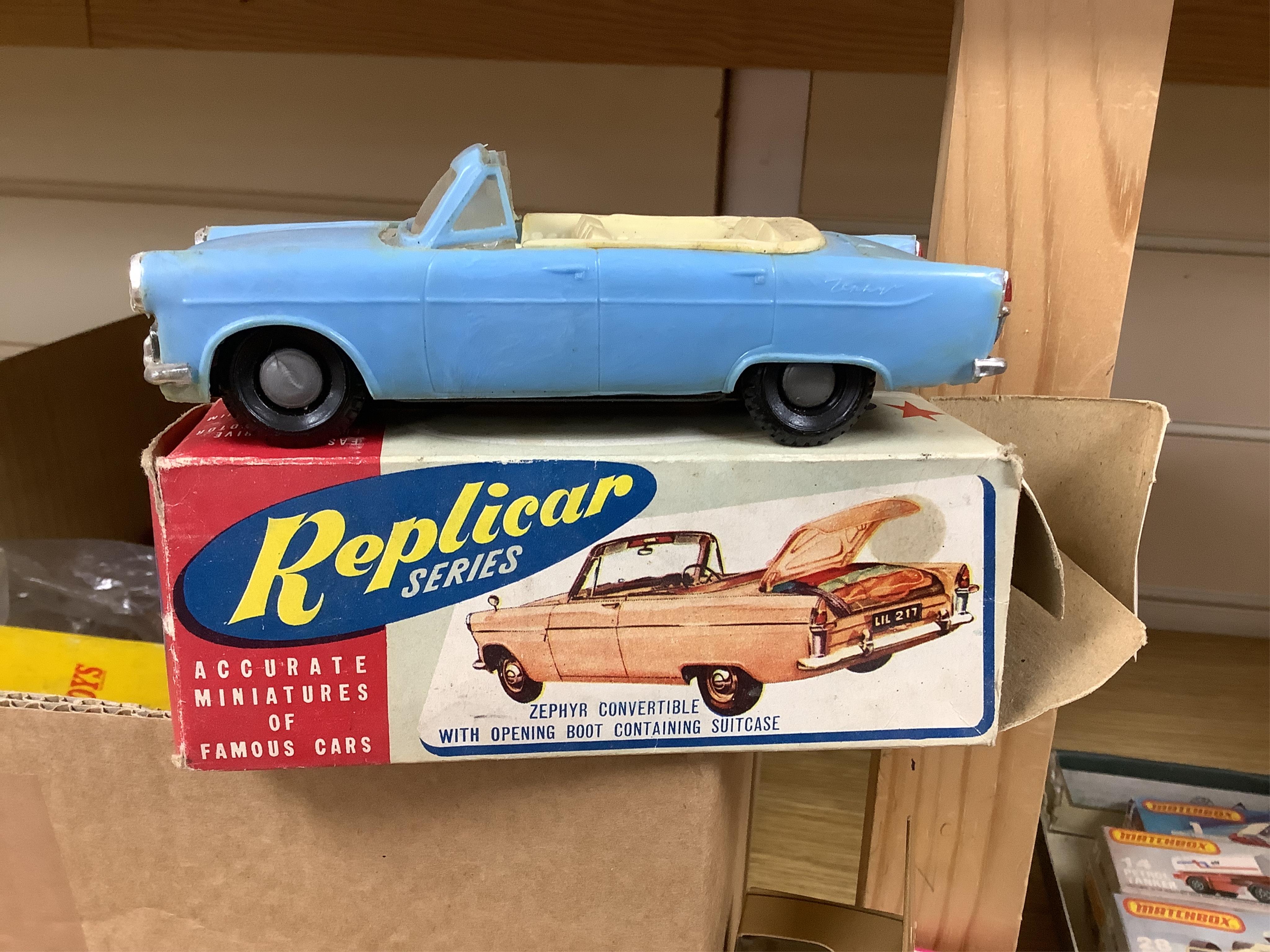 A quantity of diecast vehicles and a few useful boxes including; a boxed Clifford Series Ford Zephyr convertible, two boxed Replicar series Ford Zephyr convertibles, ten unboxed Dinky Toys, two Scalextric Formula One car